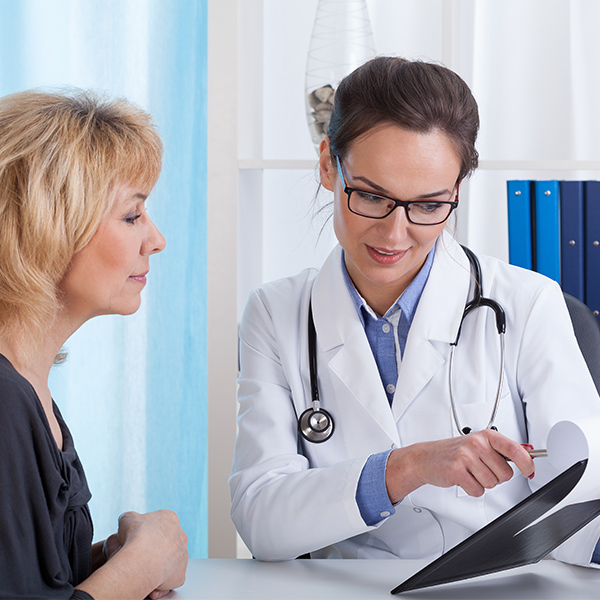 doctor-showing-patient-deductibles.jpg